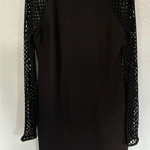 wow!! Fish net sleeves with a body hugging dress